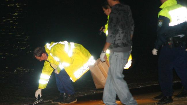 Police recover a gun at Balmoral Beach.