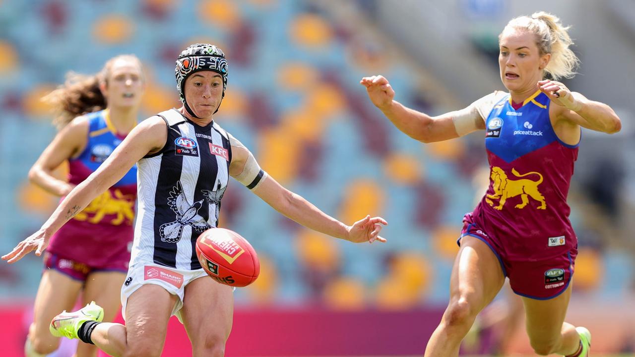 Aliesha Newman gets a kick away. Picture: Russell Freeman/AFL Photos via Getty Images