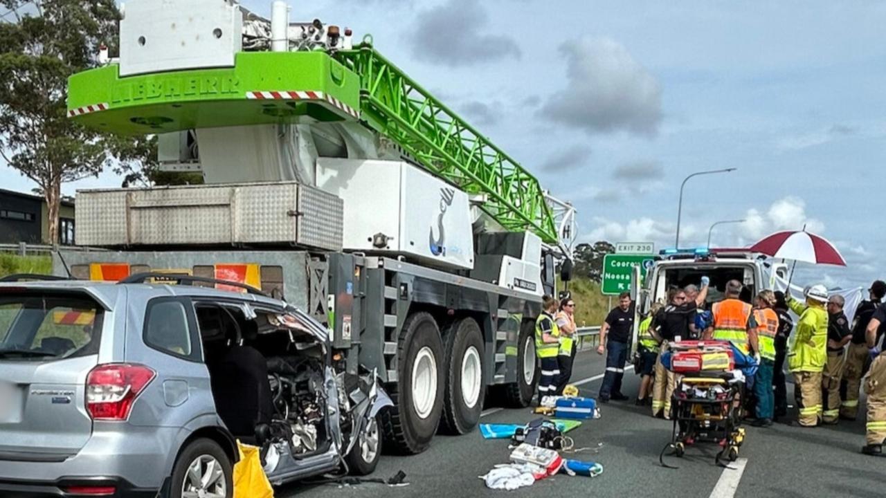 Photos reveal freak crash on Bruce Highway as teen fights for life