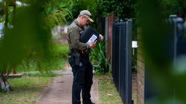 Police conduct their investigations near the scene of the incident in Jingili. Picture: Che Chorley