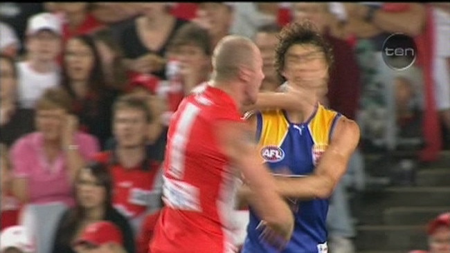 Footballer Barry Hall king hits Brent Staker.