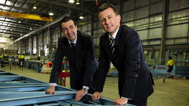 Rivergum managing director Victor Said, left, with former chief executive Marc Taintey at the company’s steel frame factory at Hendon. Pic Mark Brake