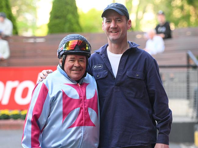 Brent Thomson poses with trainer Ciaron Maher after he was back riding at Moonee Valley trackwork session. Picture: Getty Images