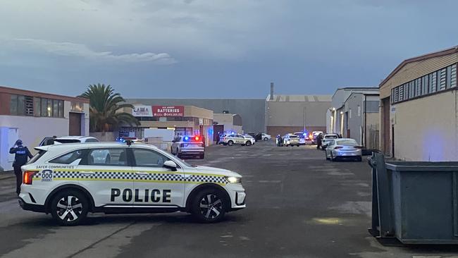 Police at the scene of the alleged shooting at Mr Rahme’s Royal Park workshop. Picture: Todd Lewis