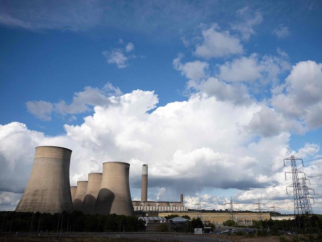 The Ratcliffe-on-Soar coal-fired power station, which is due to close at the end of the month, is pictured near Nottingham, central England on September 12, 2024. Over 140 years after the world's first coal power station was built, the UK is set to become the first G7 country to bid farewell to the polluting fuel. Ratcliffe-on-Soar, between Derby and Nottingham, is the location of Britain's last coal  power station. Its eight huge cooling towers impose themselves in the East Midlands landscape, unavoidable to the town's inhabitants. (Photo by Oli SCARFF / AFP) / TO GO WITH AFP STORY by Clement ZAMPA