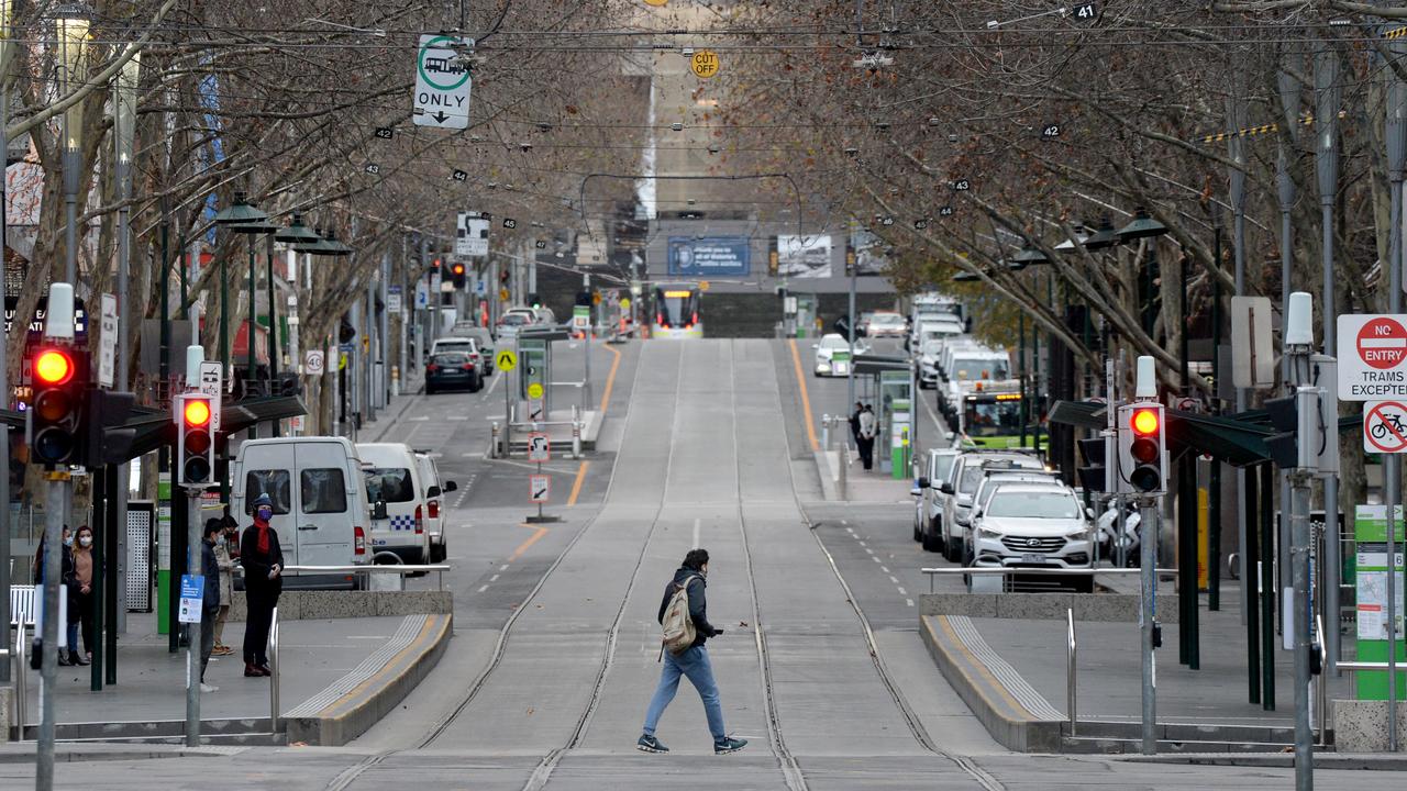 Bourke Street is almost deserted after stage 4 restrictions were introduced on Sunday night. Picture: Andrew Henshaw/NCA NewsWire