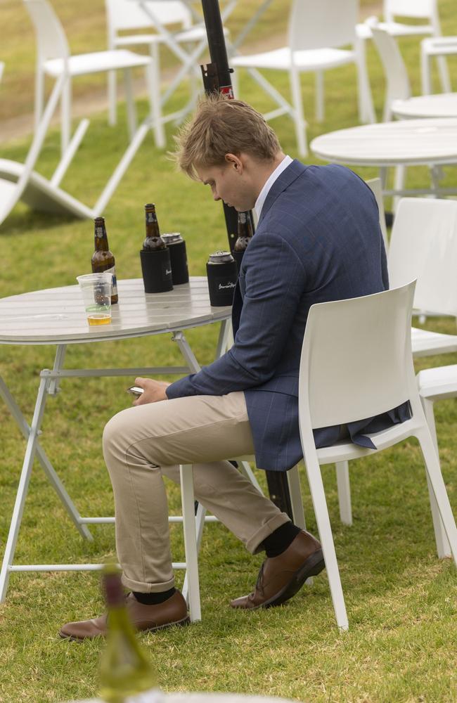 Taking a rest to order more beige chinos from The Iconic. Picture: Media Mode/news.com.au