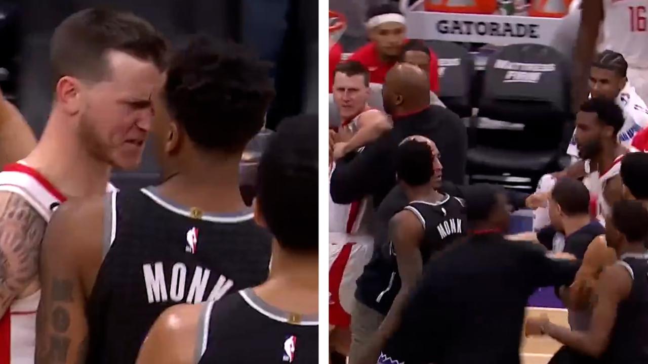 Four players ejected in wild Kings-Rockets scuffle.