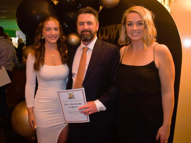 Lola Hegarty, Boyd Hegarty and Andrea Hegarty having a great night at the Cowwarr Saints Football &amp; Netball Club Golden Gala Ball 2024. Picture: Jack Colantuono