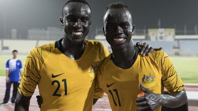 Thomas Deng and Awer Mabil after the Kuwait match. Picture: AFP