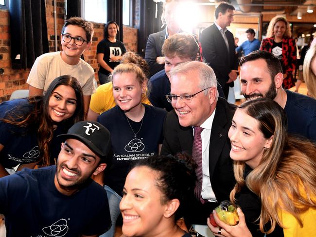 BRISBANE, AUSTRALIA - NewsWire Photos - MAY 18, 2021. Australian Prime Minister Scott Morrison and Queensland Senator Amanda Stoker (far right) pose for a group selfie during a Women Enterprising event at River City Labs in Brisbane.Picture: NCA NewsWire / Dan Peled