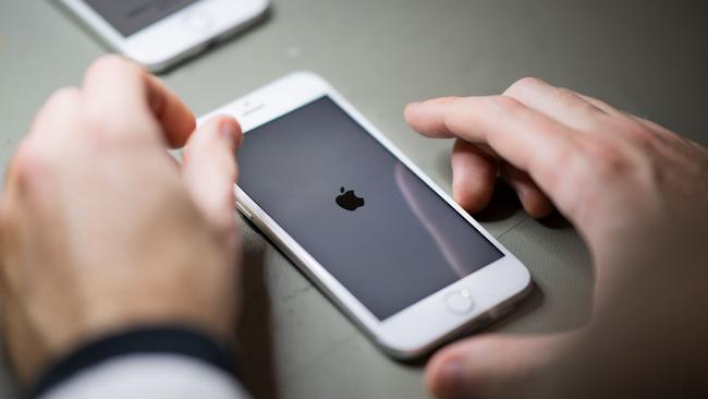 A quick number-crunching exercise carried out earlier this year shows just how impressive the returns have been for Apple and Microsoft versus Commonwealth Bank and BHP in the last five years. Picture: AFP
