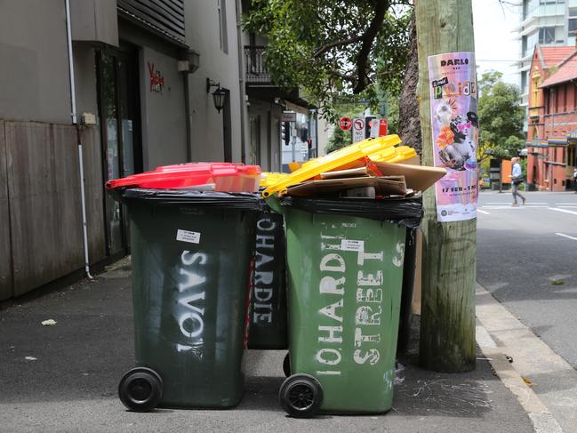 SYDNEY, AUSTRALIA - Newswire photos FEBUARY 08 2022: A view of bins out full of rubbish waiting to be emptied in Darlinghurst as the waste workers strike continues leaving the streets of the city of Sydney overrun with rubbish. Picture: NCA Newswire / Gaye Gerard