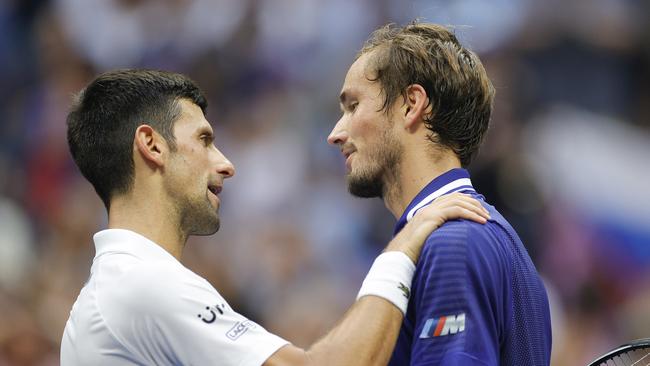 Daniil Medvedev (R) of Russia and Novak Djokovic (L) of Serbia talk at centre court after Medvedev won their Men's Singles final match on Day Fourteen of the 2021 US Open. (Photo by Sarah Stier/Getty Images)