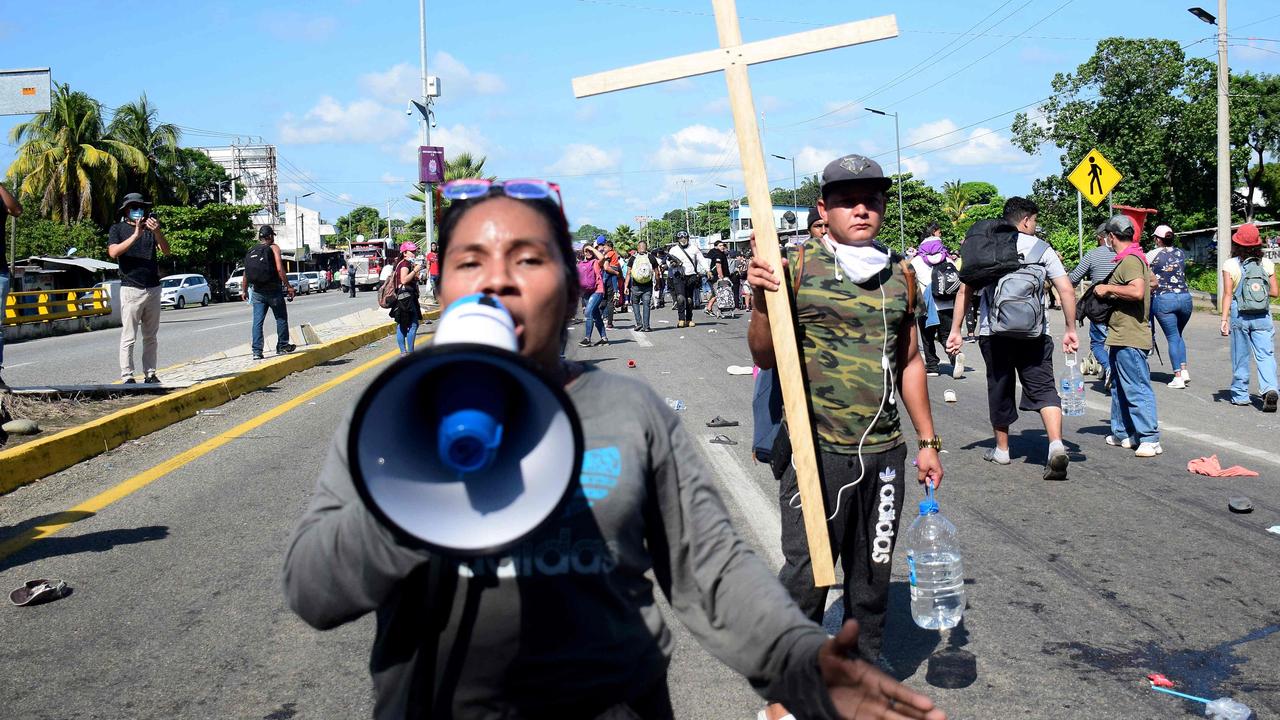 Migrants had to register with a QR code to join the caravan, according to reports. Picture: Damian Sanchez/AFP