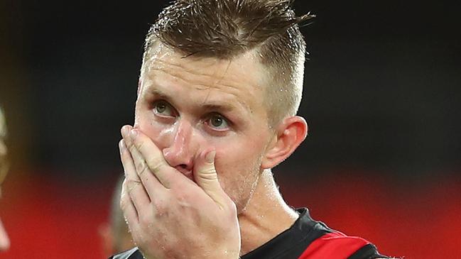 GOLD COAST, AUSTRALIA - AUGUST 07: Shaun McKernan of the Bombers looks dejected after losing the round 10 AFL match between the Essendon Bombers and the Greater Western Sydney Giants at Metricon Stadium on August 07, 2020 in Gold Coast, Australia. (Photo by Chris Hyde/Getty Images)