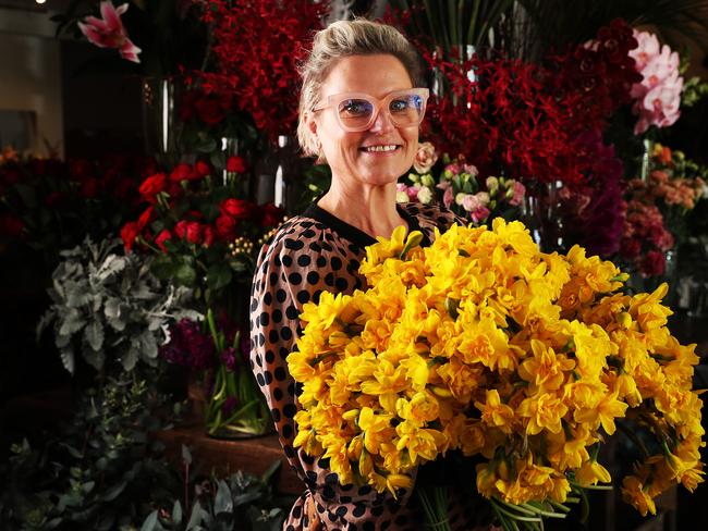 Kate Sice owner of Botanical in West Hobart with double Daffodils. Spring is here. Picture: NIKKI DAVIS-JONES