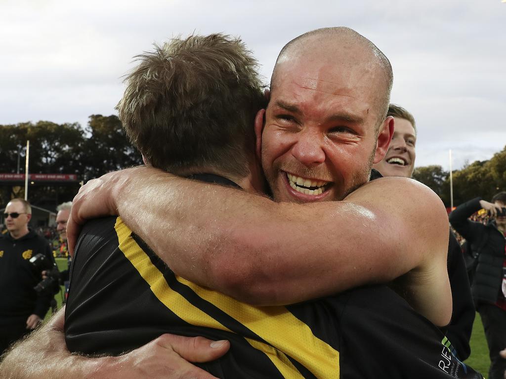 SANFL - GRAND FINAL  22/09/19 - Port Adelaide v Glenelg at Adelaide Oval. Aaron Joseph hugs coach Mark Stone after the win Picture SARAH REED