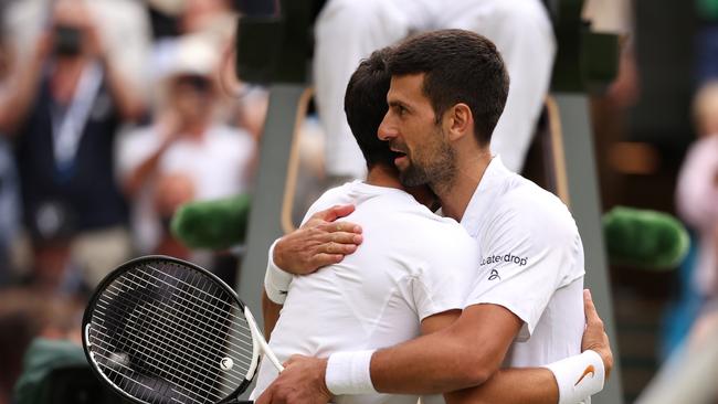 Novak Djokovic embraces Carlos Alcaraz after the match. Picture: Getty Images.