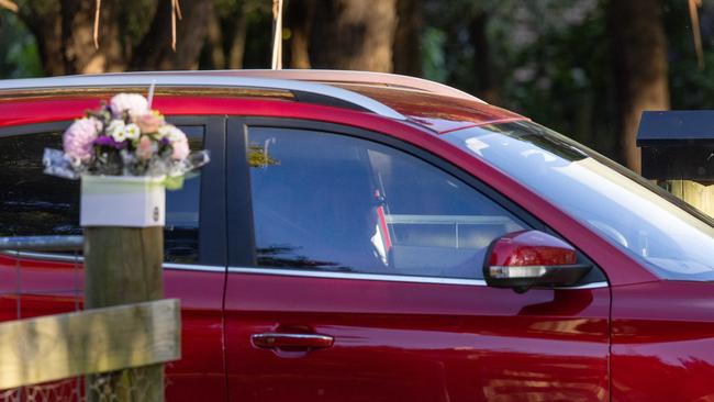 Flowers are left at the front of the Leongatha home. Picture: Jason Edwards