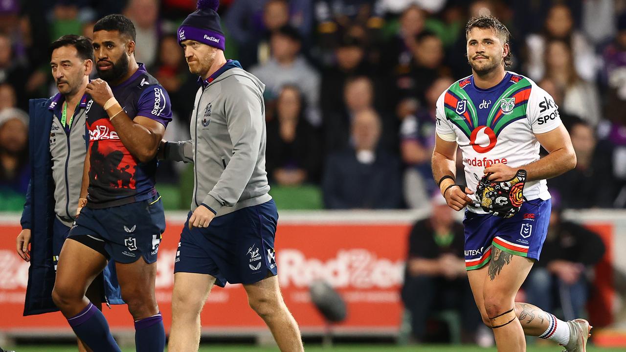 Josh Curran (R) of the Warriors walks off the field after being sent to the sin bin (Photo by Robert Cianflone/Getty Images)