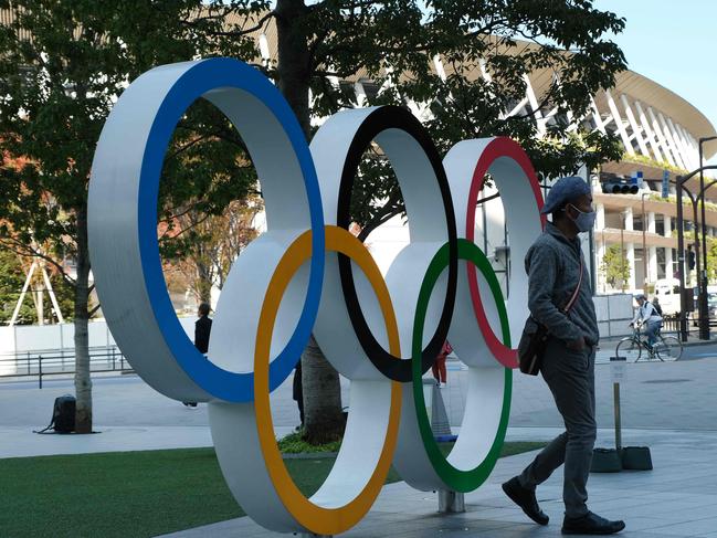 The Olympic rings is displayed outside the National Stadium in Tokyo on November 15, 2020. Photo/AFP