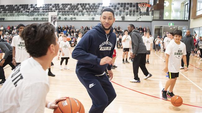 Simmons plays basketball with kids during his annual Ben Simmons Basketball Camp at Mullum Mullum Stadium, Donvale. Picture: AAP Image/Ellen Smith