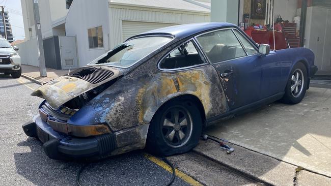 Adam Turnbull's 1974 Porsche 911S went up in flames after he tried to start it on Father's Day morning. Picture: Gabriel Polychronis