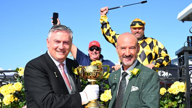 Eddie McGuire and Glen Boss pose with the Melbourne Cup. Picture: Getty Images