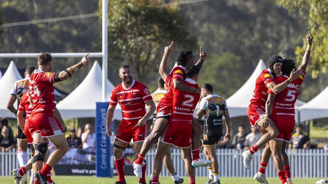 Walgett Aboriginal Connection celebrates its win in the Koori Knockout. Picture: Andrea Francolini