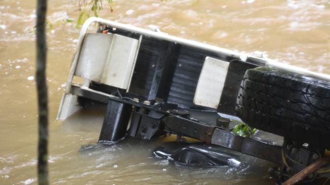 A Calen woman was found inside the vehicle after it was swept off a flooded roadway about 5am on Wednesday, May 11, 2022. Picture: Max O'Driscoll