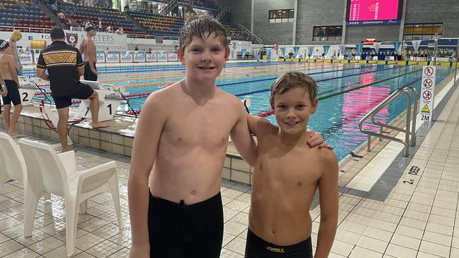 Two members of Iona's 4x50m medley winning team, Harry Young St Ledger and Ryder Henrick.