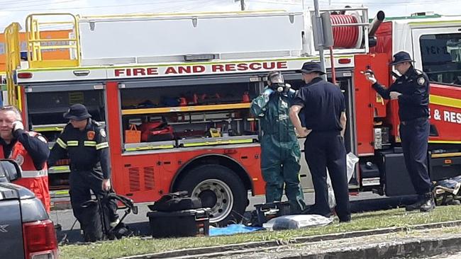 Department of Environment officers were called to the scene of a fire at Woodridge after medical and COVID waste caught fire in the back of a JJ Richards truck.