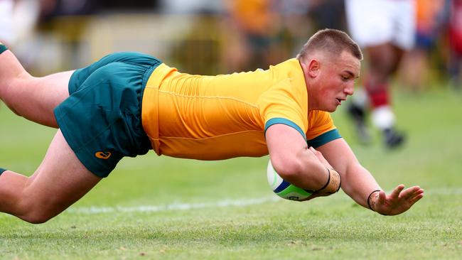 Kingsley Uys scores a try against New Zealand Barbarians in Hamilton, New Zealand. Picture: Getty Images for Rugby Australia