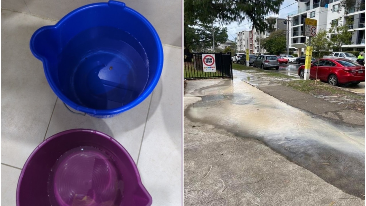 Sydney resident collecting floodwater with buckets to flush toilet as