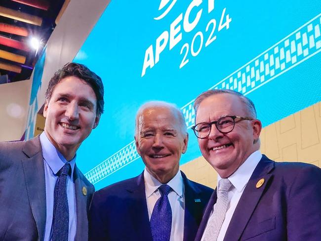 Canada’s Prime Minister Justin Trudeau, US President Joe Biden and Australian Prime Minister Anthony Albanese pose for a picture during the APEC Summit at the Convention Centre in Lima. Picture: AFP