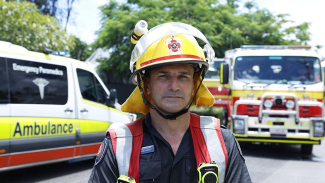 Queensland Fire and Emergency Services firefighters attend a large house fire at Christensen Street, Machans Beach. Cairns fire station officer Jose Lopez. Picture: Brendan Radke