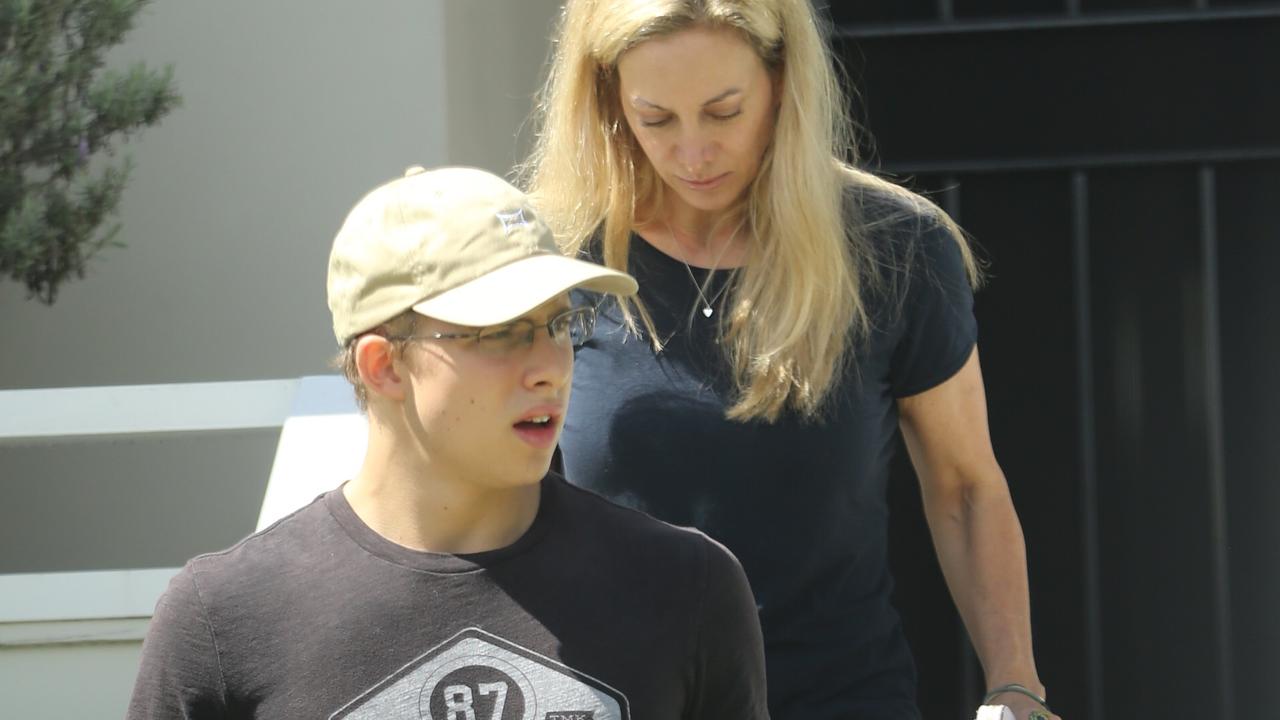 Kyle Daniels leaving his Balgowlah home with his mother on Thursday afternoon. Picture: John Grainger