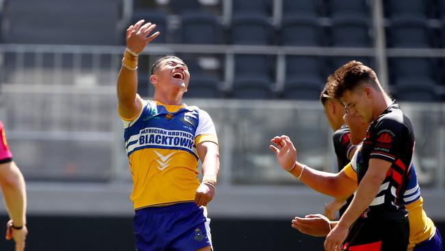 Patrician Brothers’ Isaiya Katoa scores a try in their 32-24 win over Endeavour. Picture: Toby Zerna