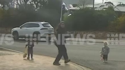 Shocking dashcam vision has captured the moment two children wander into traffic on one of Adelaide’s busiest roads. Picture: 9News