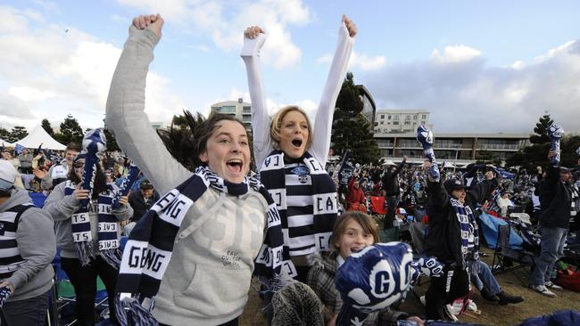 Kai Wilkie-Bourke, Laura Schran and Tullia Williams watch on at a Cats live site.