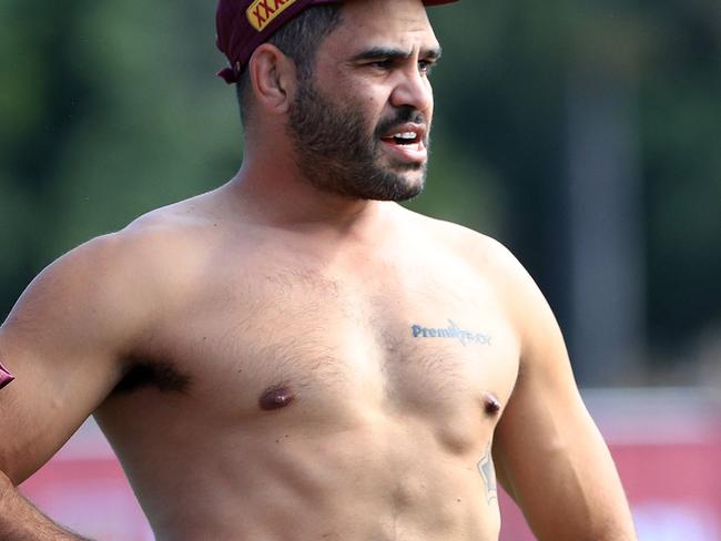 Greg Inglis and the Queensland Origin team hold an opposed session at Sanctuary Cove ahead of game 1 in Melbourne. Pics Adam Head