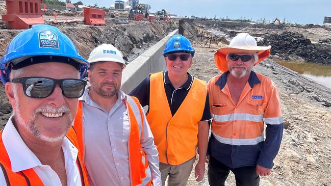 Hamish Pressland and Phil Tyrer of Pelican Waters with Nigel Holly and Michael Fields of Hall Contracting. Photo: Pelican Waters