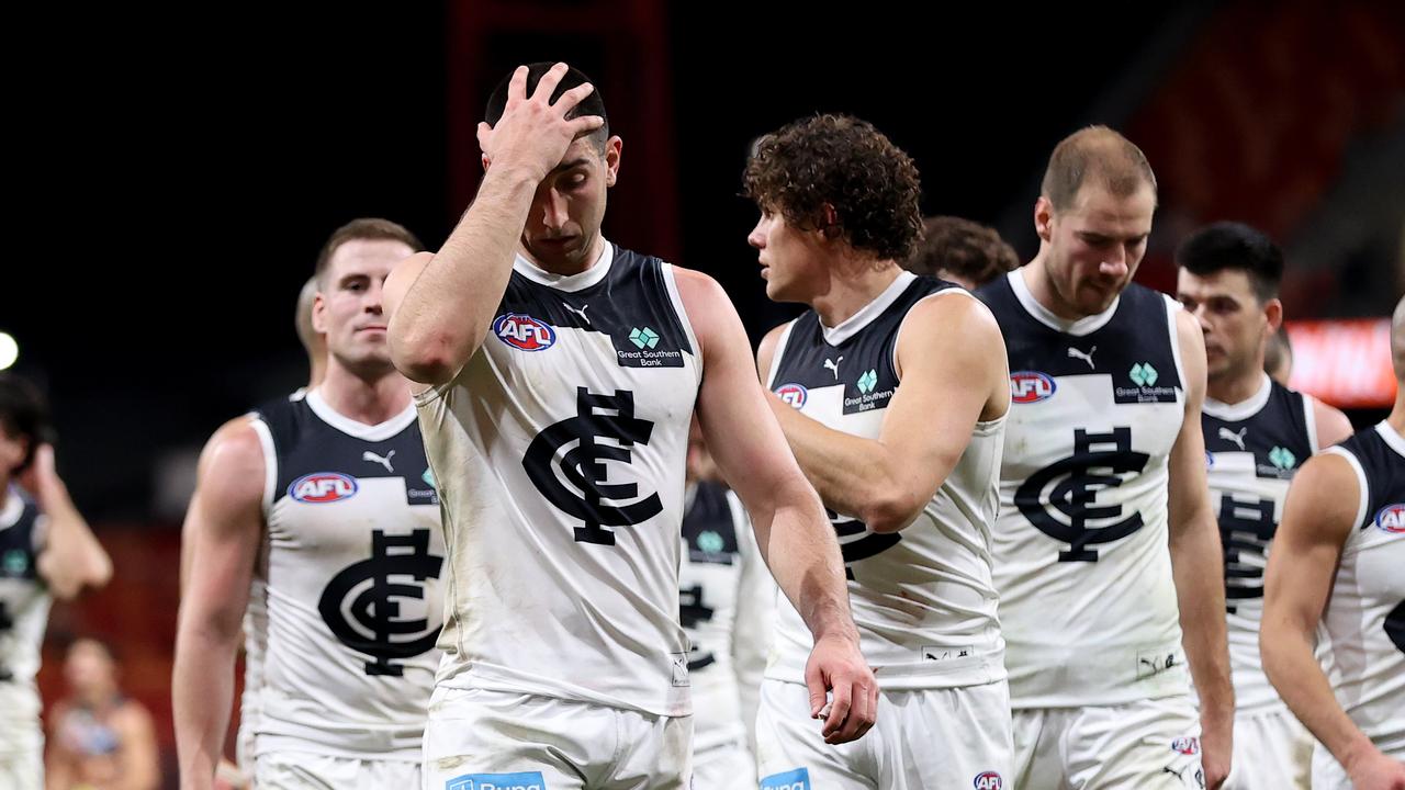 SYDNEY, AUSTRALIA - JULY 06: Blues players leave the field during the round 17 AFL match between Greater Western Sydney Giants and Carlton Blues at ENGIE Stadium, on July 06, 2024, in Sydney, Australia. (Photo by Brendon Thorne/AFL Photos/via Getty Images)