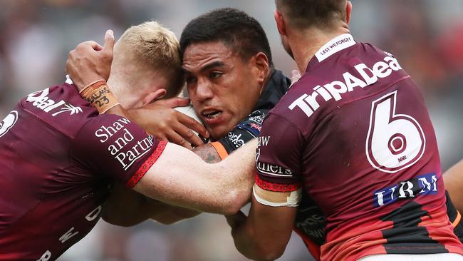 Joe Ofahengaue on the charge for Wests Tigers (Photo by Matt King/Getty Images)