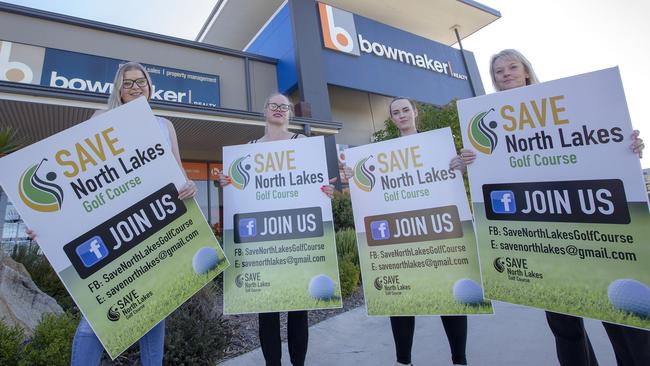 Bowmaker Realty staff ltr Samantha Stephens, Samantha Eason, Ashlea Robinson and Jane Longmuir support the campaign to stop the sale of North Lakes golf club to developers. (AAP/Sarah Marshall)