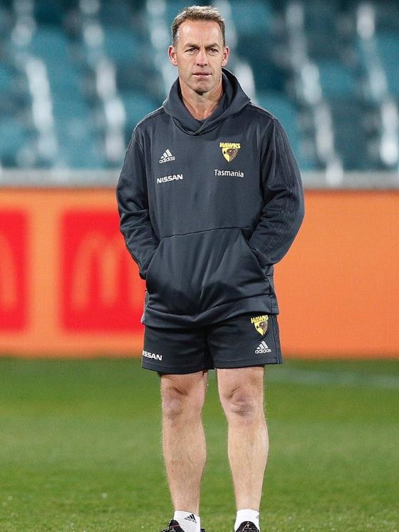 You’re keen wearing shorts in those conditions, Clarko. Picture: Twitter/@HawthornFC