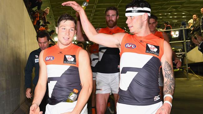 Toby Green and Nathan Wilson celebrate the win over the Bulldogs.