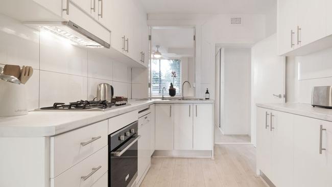 The galley-style kitchen in the apartment. Picture: realestate.com.au