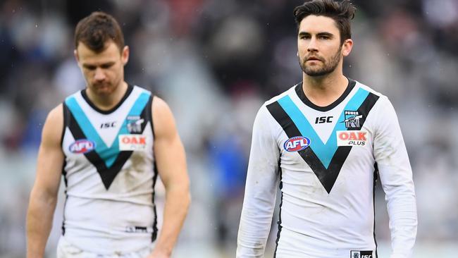 Port’s Robbie Gray and Chad Wingard leave the field after yesterday’s game. Picture: Getty Images